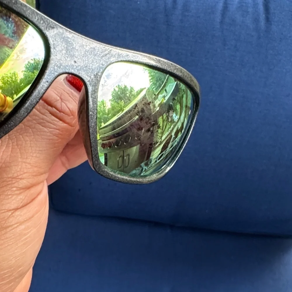 Stylish Black Sunglasses with Gold Lenses